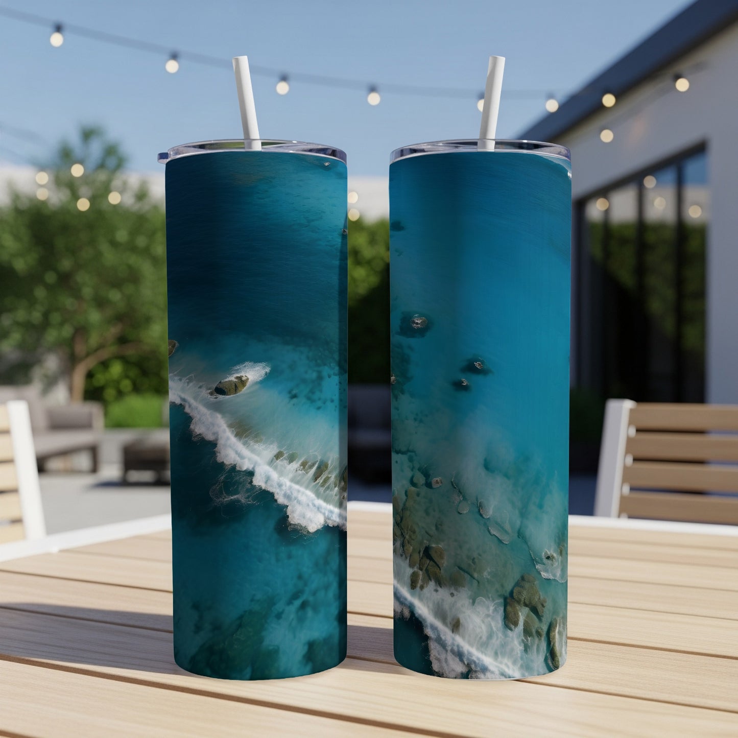 Two tumblers with aerial ocean waves and rocky coastline design.