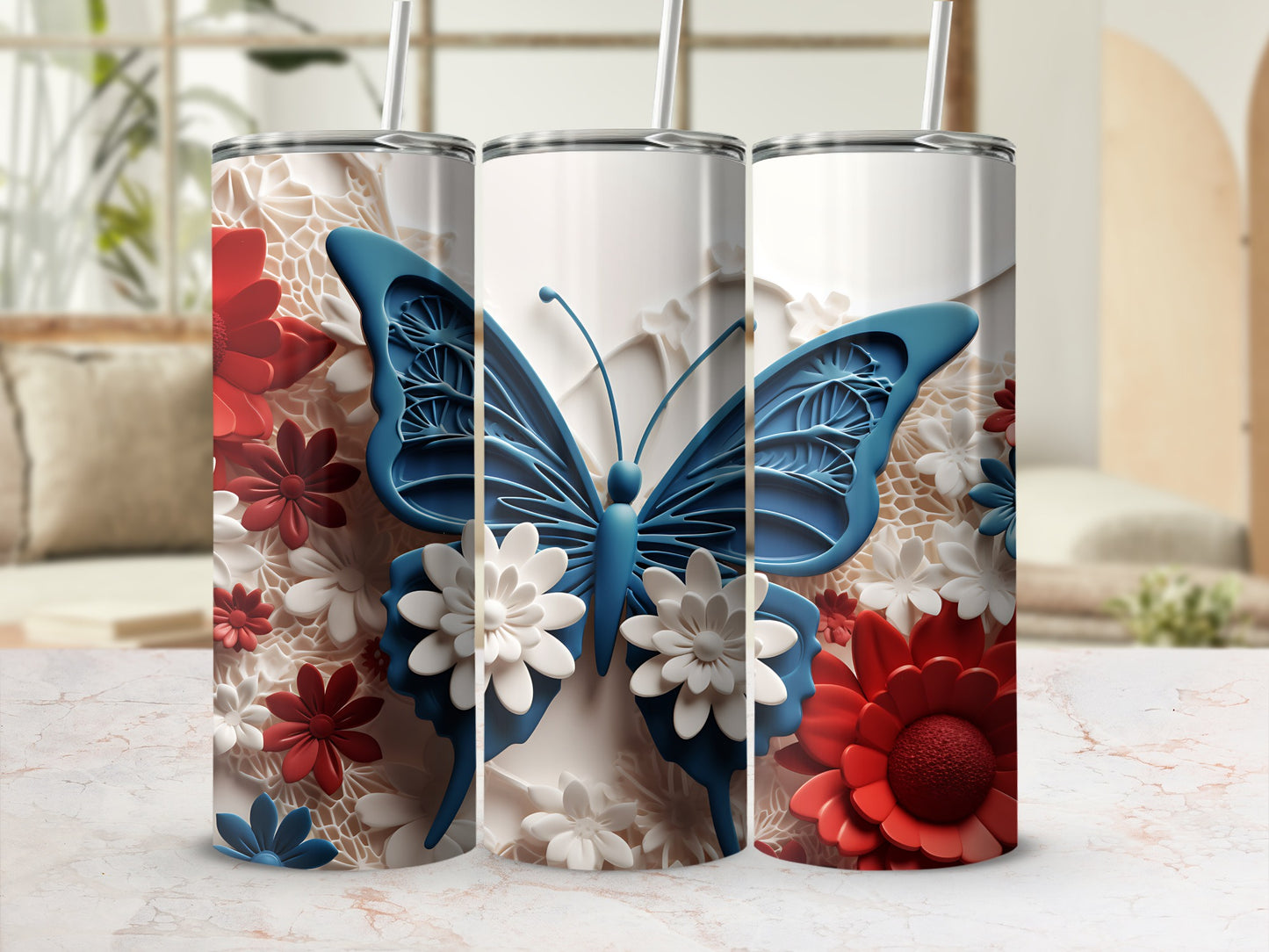 White tumbler with blue butterfly and red and white flowers.