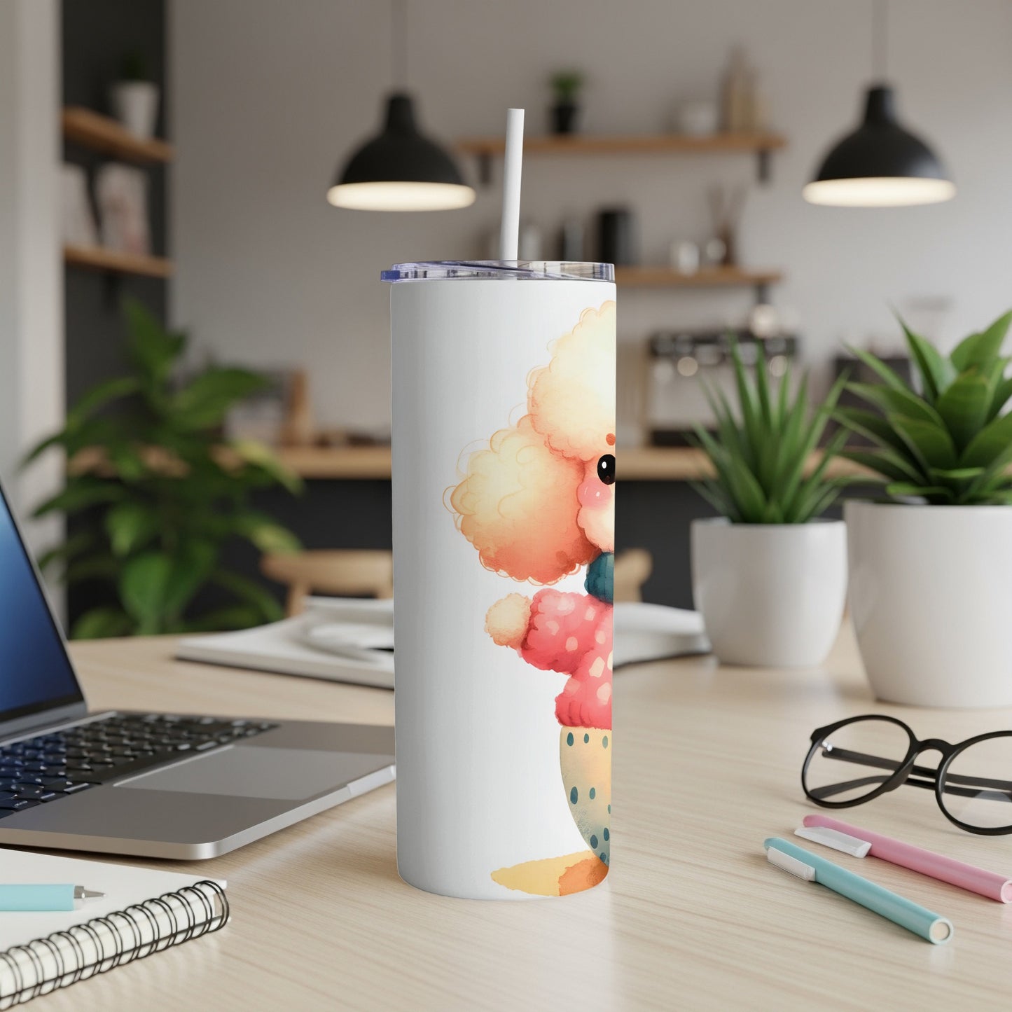 White tumbler with watercolor poodle wearing a pink sweater and scarf.