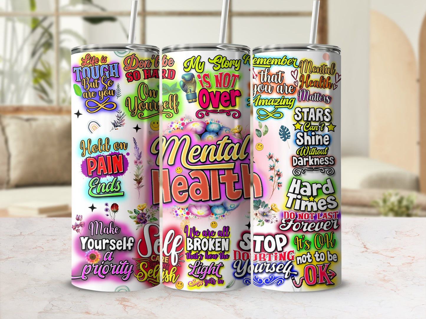 Tumblers with mental health quotes and colorful graphics.