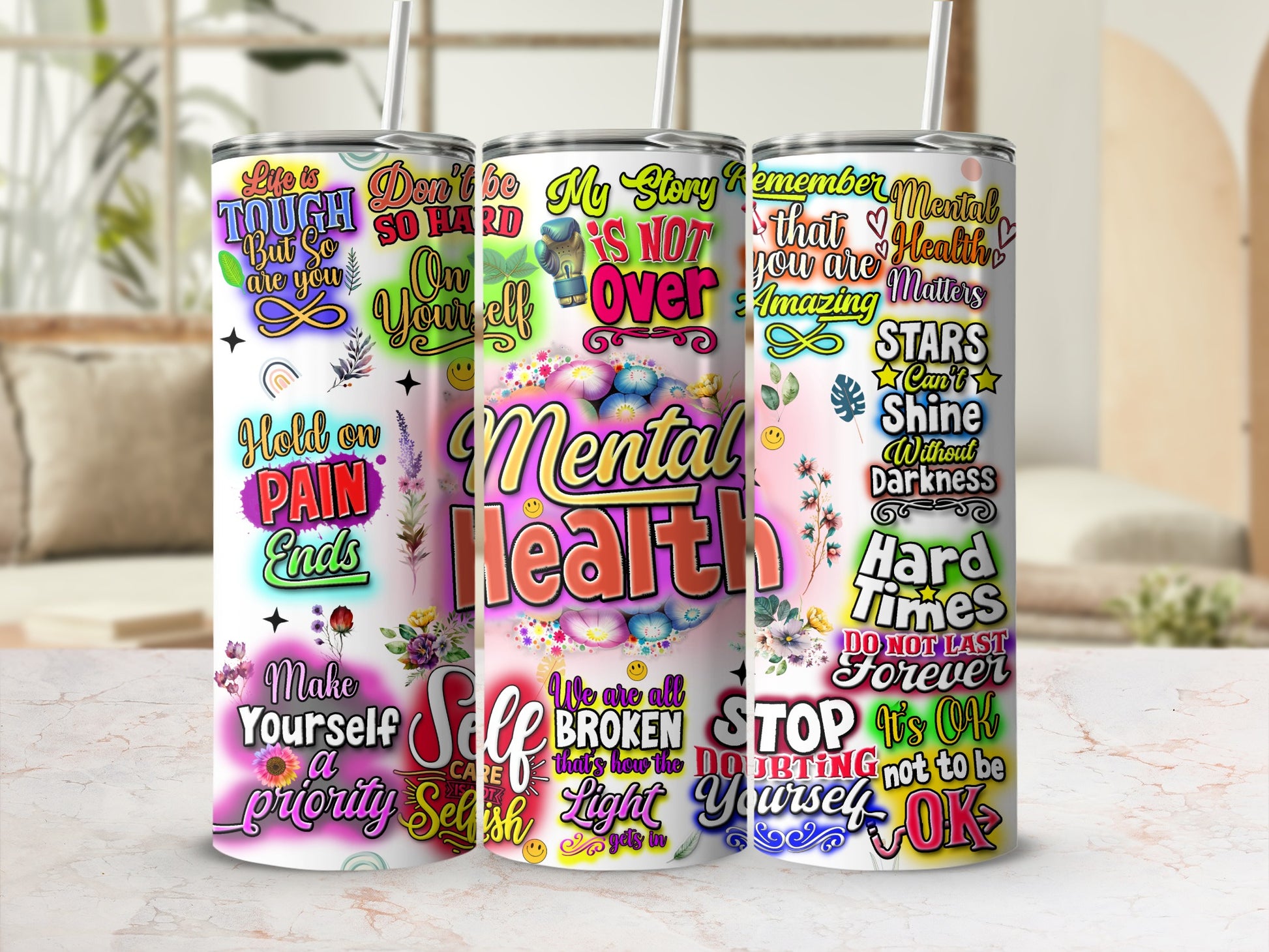 Tumblers with mental health quotes and colorful graphics.