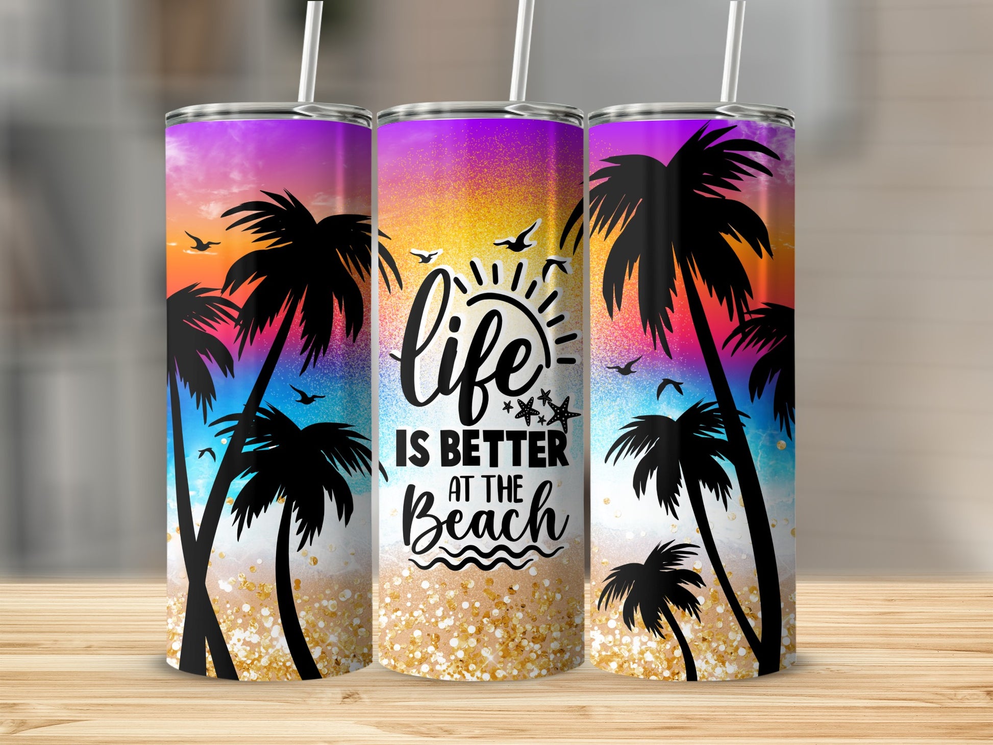 Tumbler with sunset beach scene and "life is better at the beach" text.