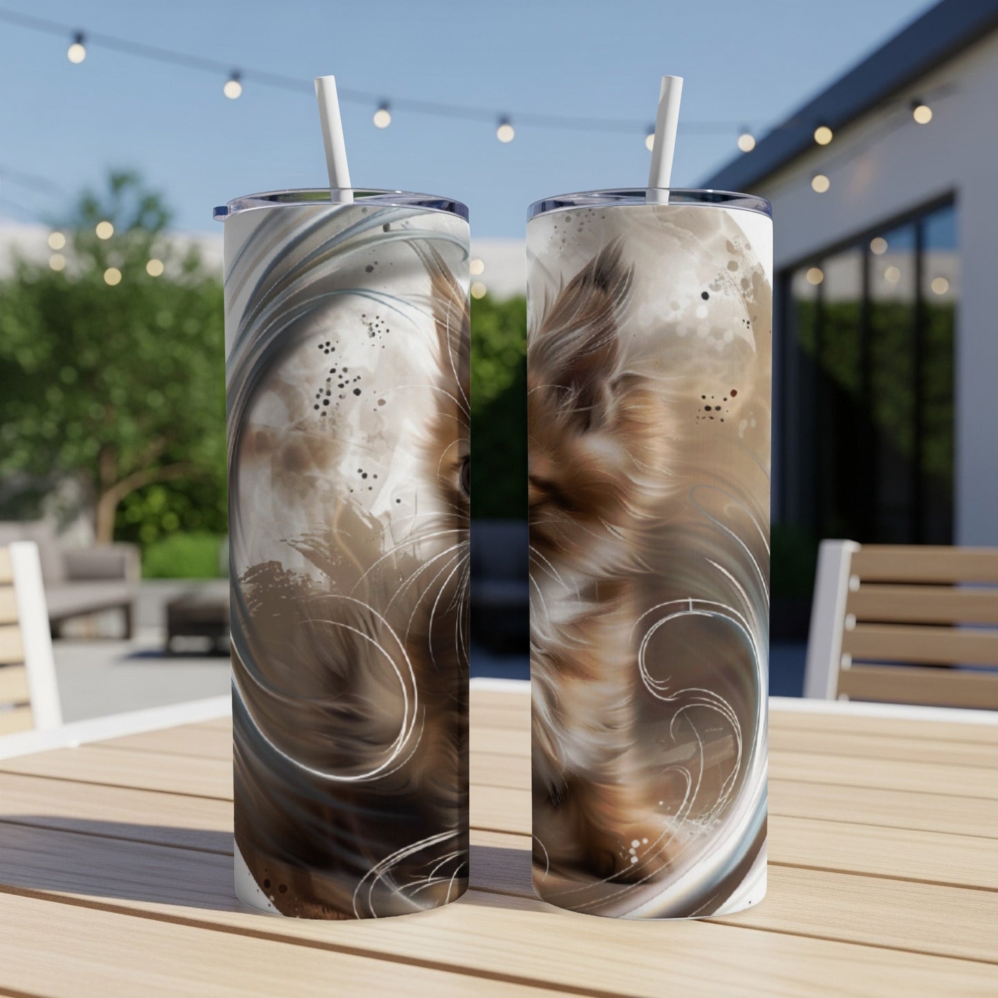 Two tumblers with a painted Yorkshire Terrier portrait and decorative swirls.