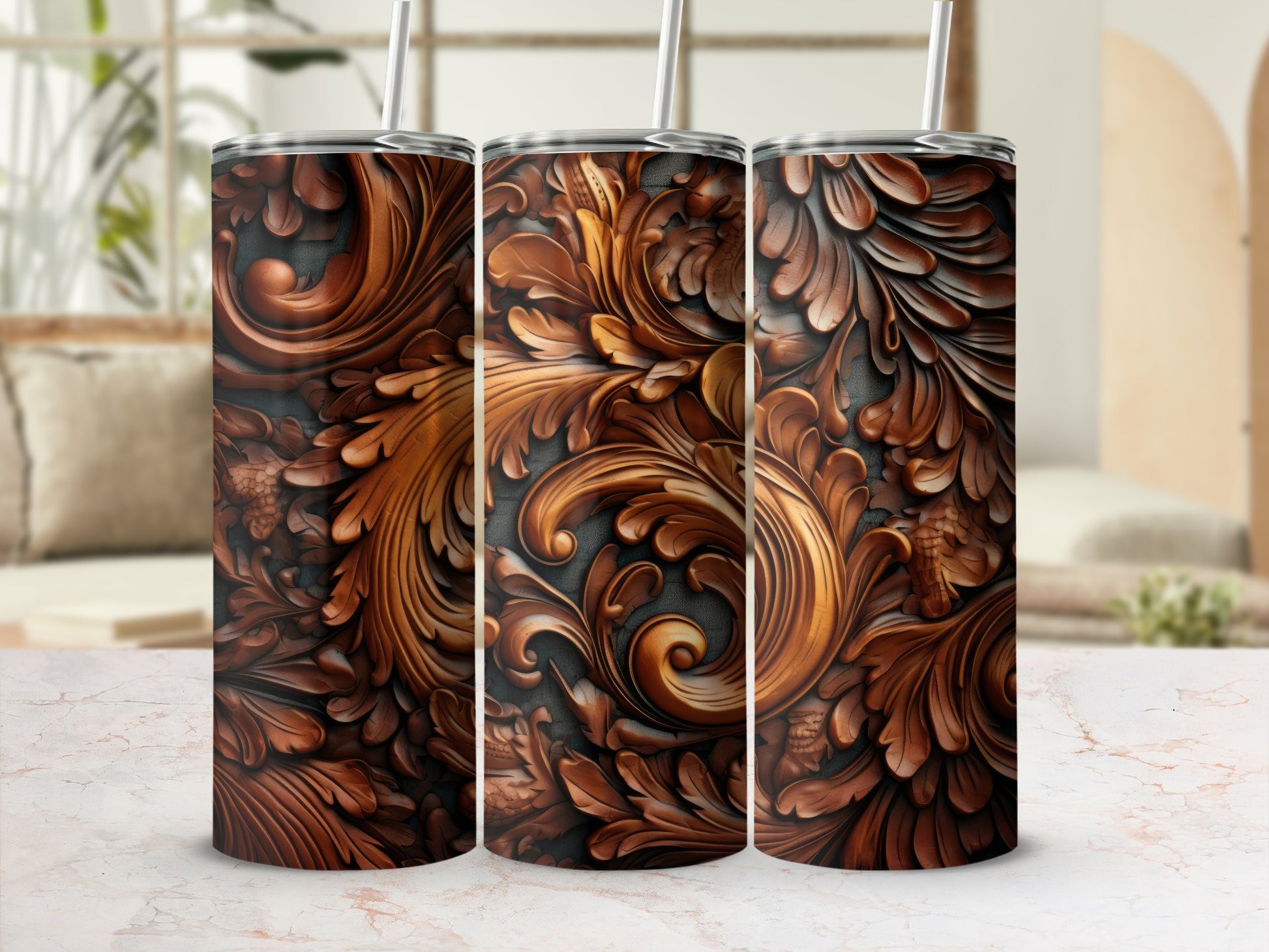 Three tall, ornate, brown tumblers with intricate swirling floral designs.