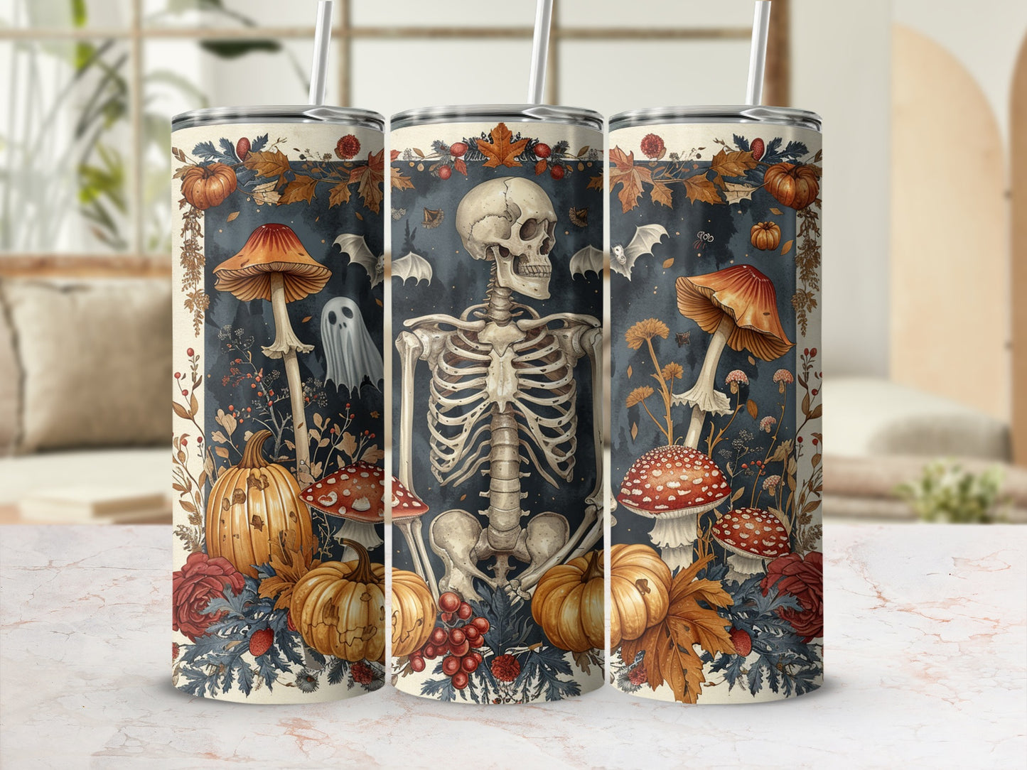 Three tumblers with skeleton, pumpkins, mushrooms, bats, and ghost Halloween design.