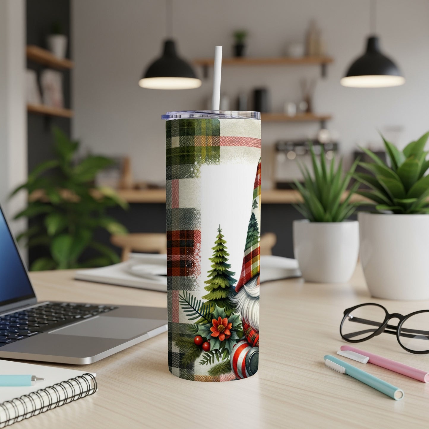 Christmas gnome tumbler with plaid and pinecone accents.