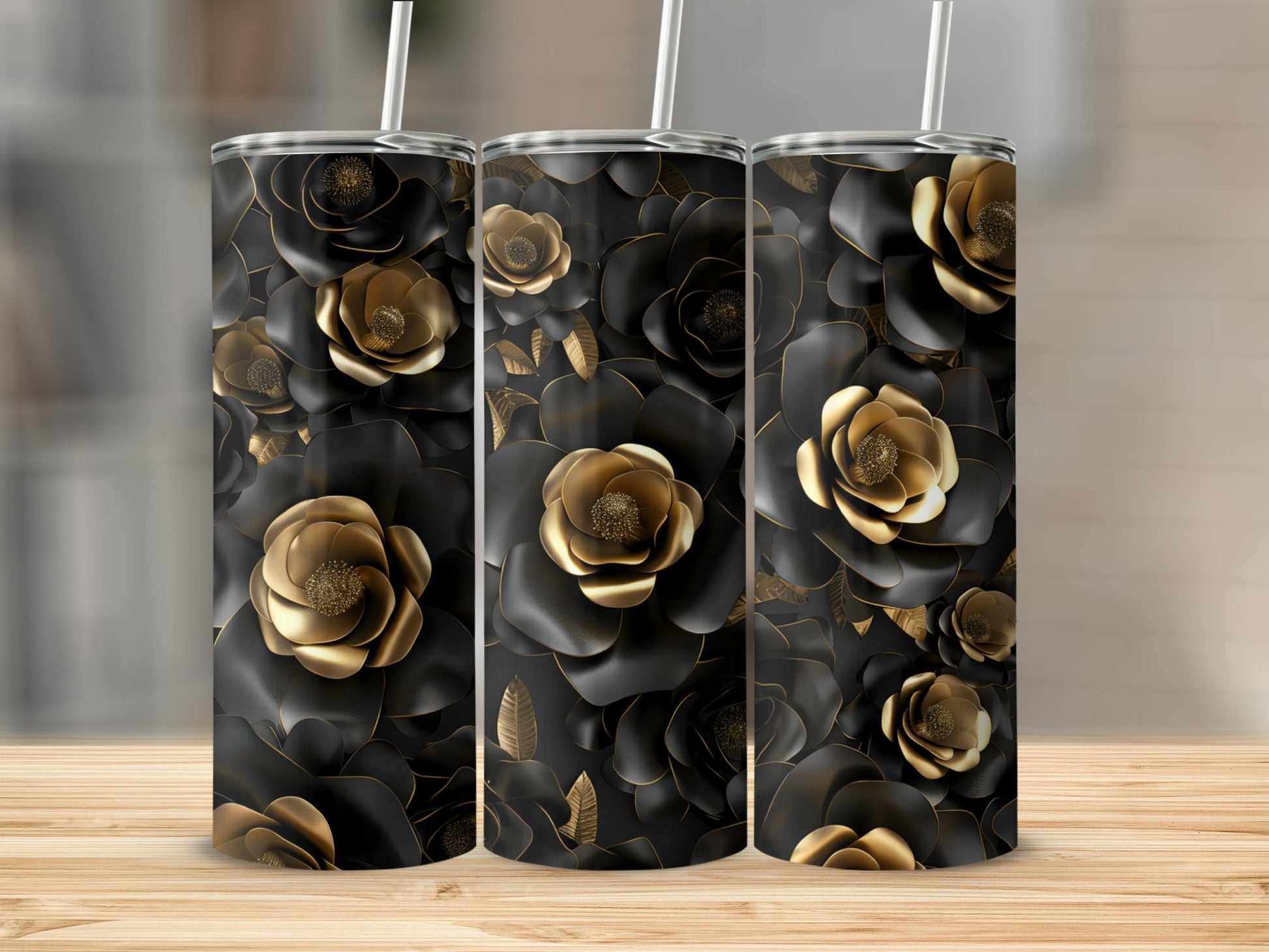 Triptych of black and gold floral tumblers with straws.