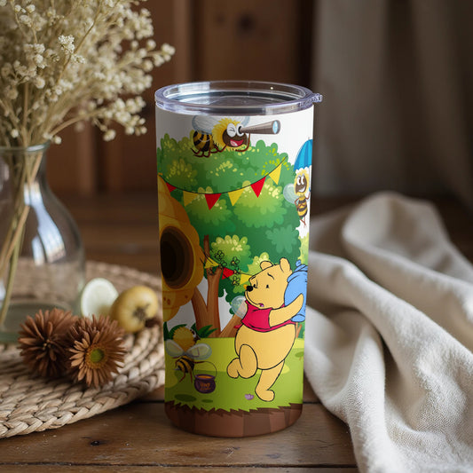 Winnie the Pooh themed tumbler with forest scene