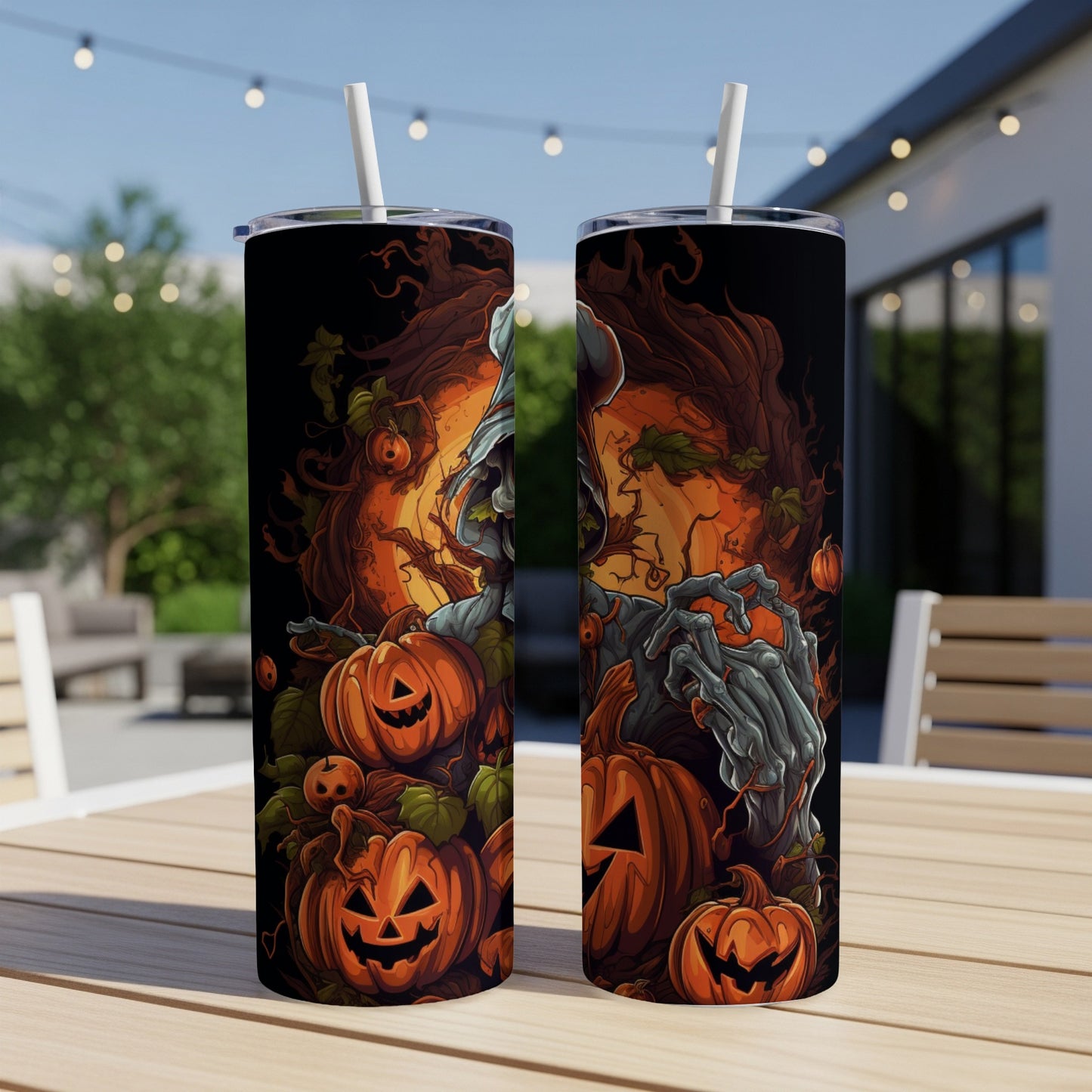 Two Halloween tumblers with spooky pumpkins and a grim reaper design.