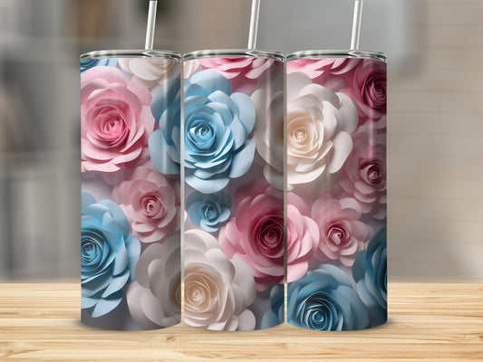 Three tumblers with a floral pattern of pink, blue, and white paper roses.