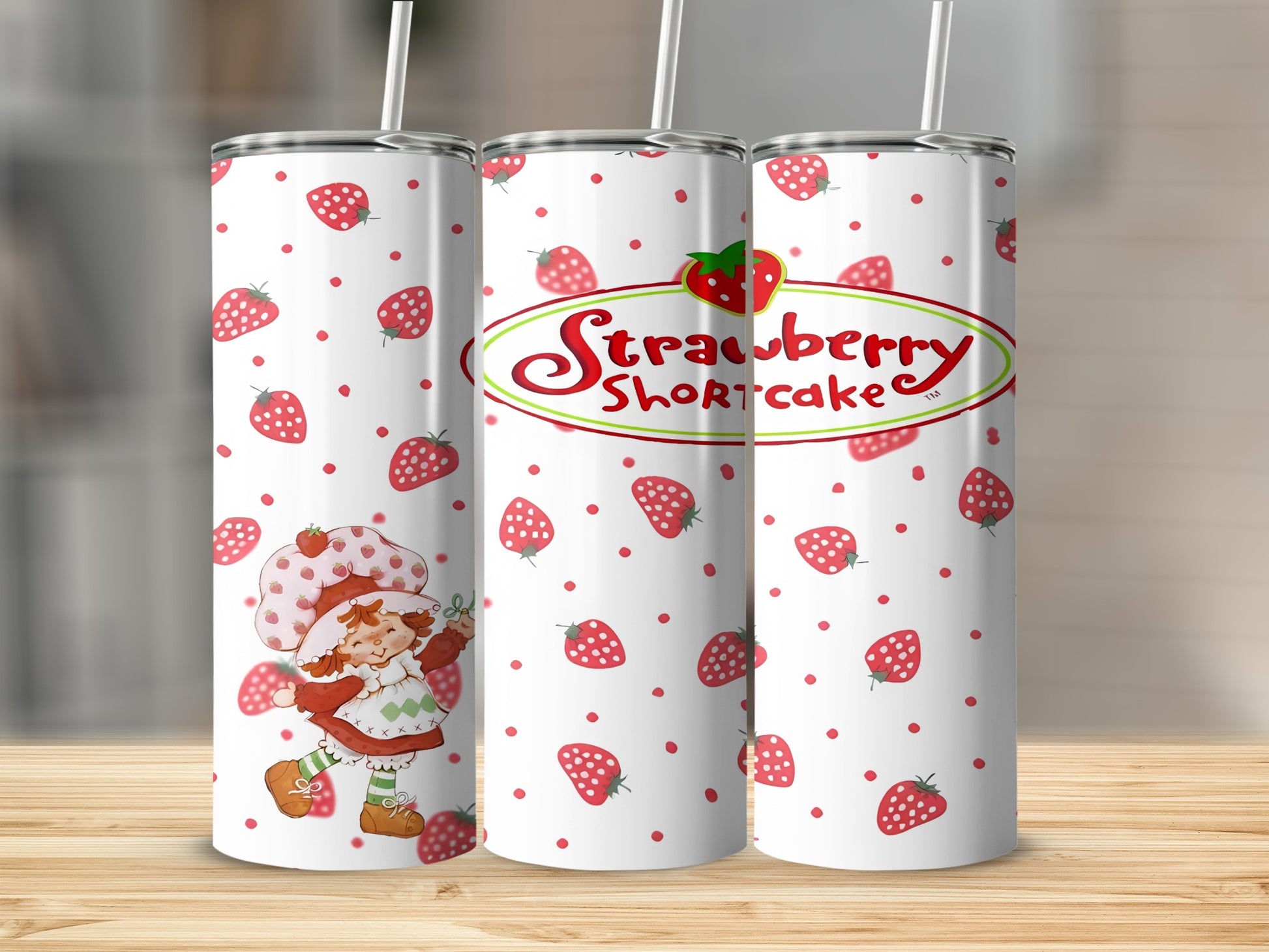 Strawberry Shortcake tumbler with recurring strawberry and character design.