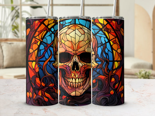 Triptych of stained glass tumblers featuring a central skull design and floral motifs.
