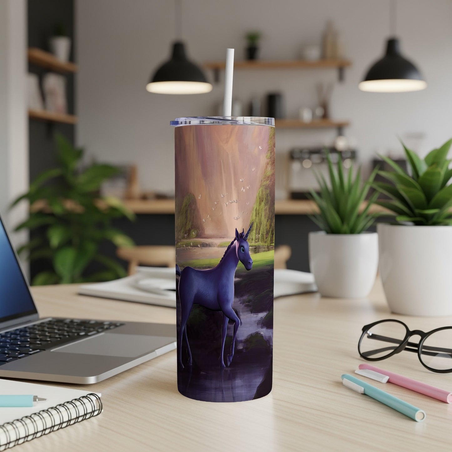 Purple unicorn with a colorful, abstract background on a tumbler.