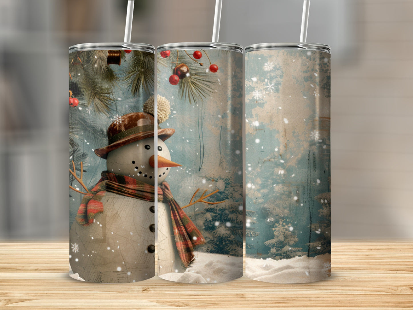 Three tumblers featuring a snowman design with a winter forest background.