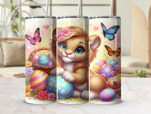 Lion cub with colorful Easter eggs and butterflies, three tumblers.