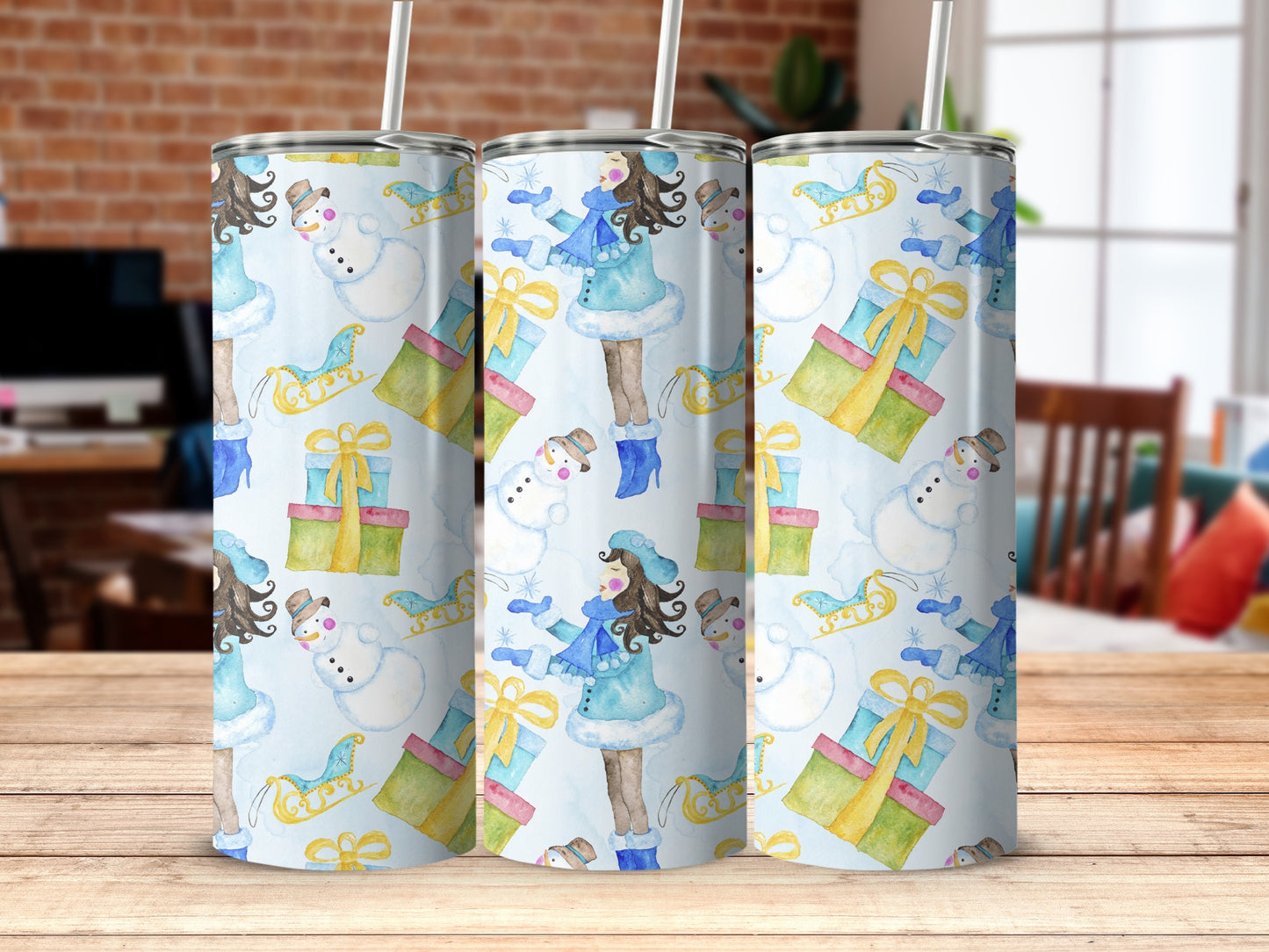 Winter scene tumbler with snowmen, gifts, and sleds, featuring a girl in blue.