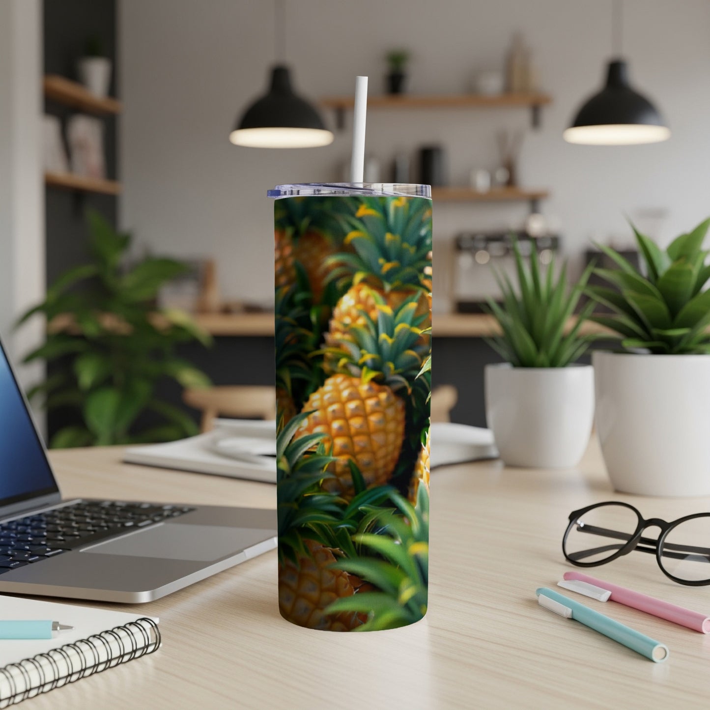 Tall tumbler with a pattern of ripe pineapples and green leaves.