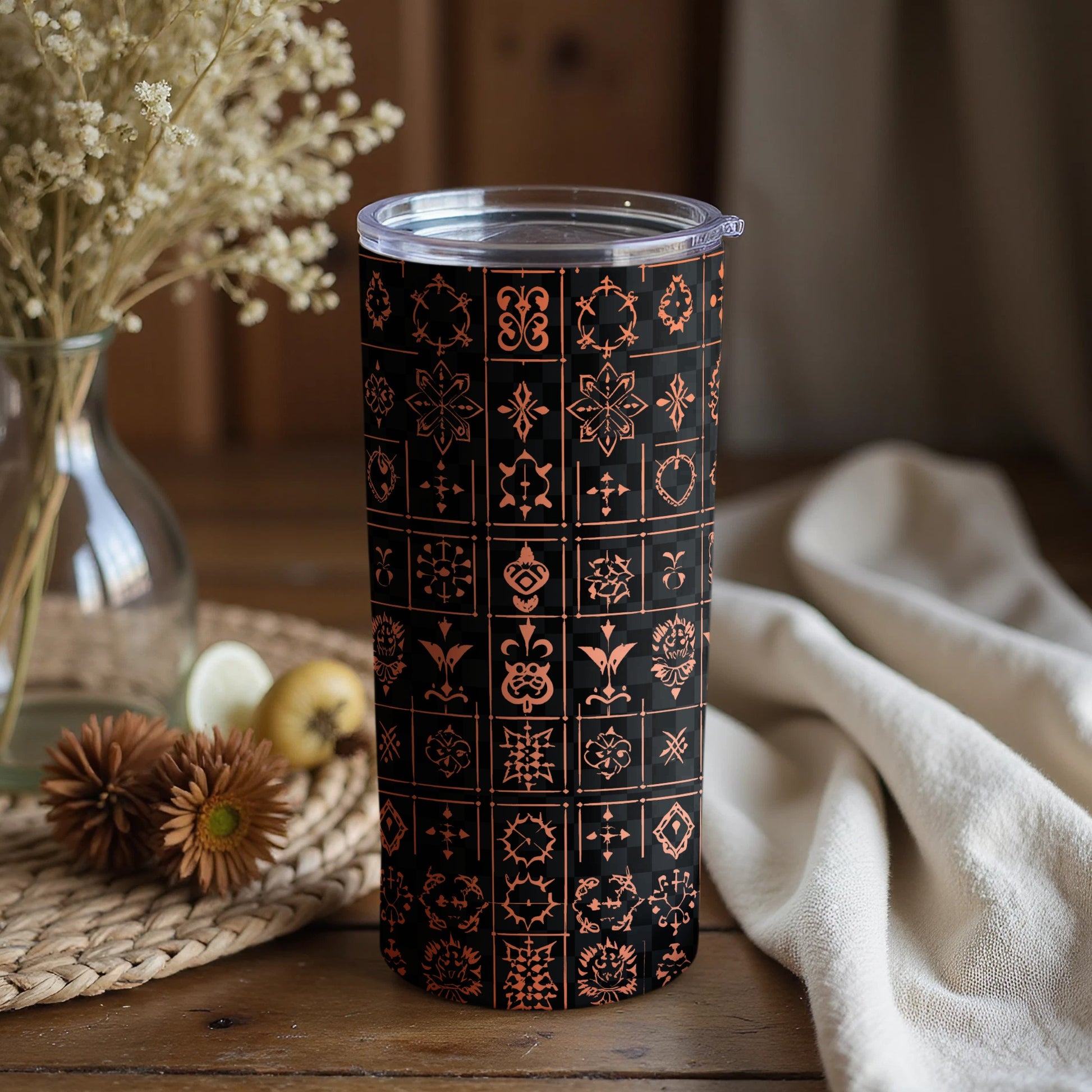Elegant Black Tumbler with Intricate Copper Pattern Design