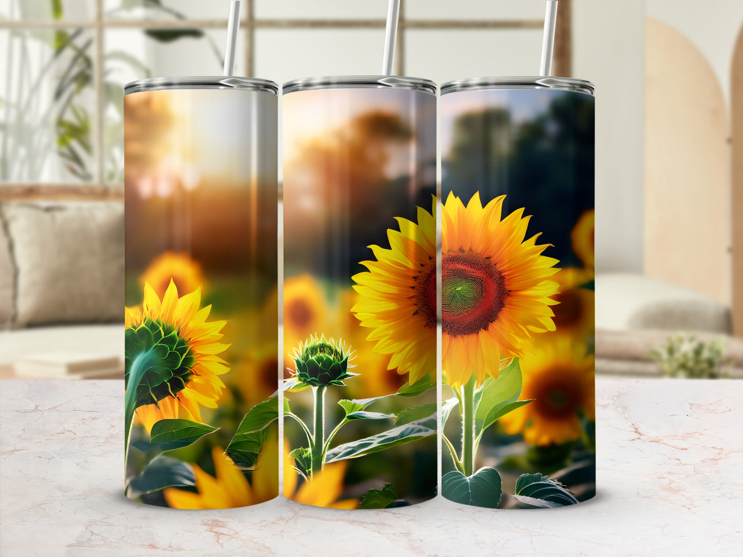 Three sunflowers on tumblers against a blurred floral background.