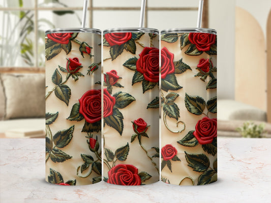 Three tumblers with a textured red rose and green leaf pattern.