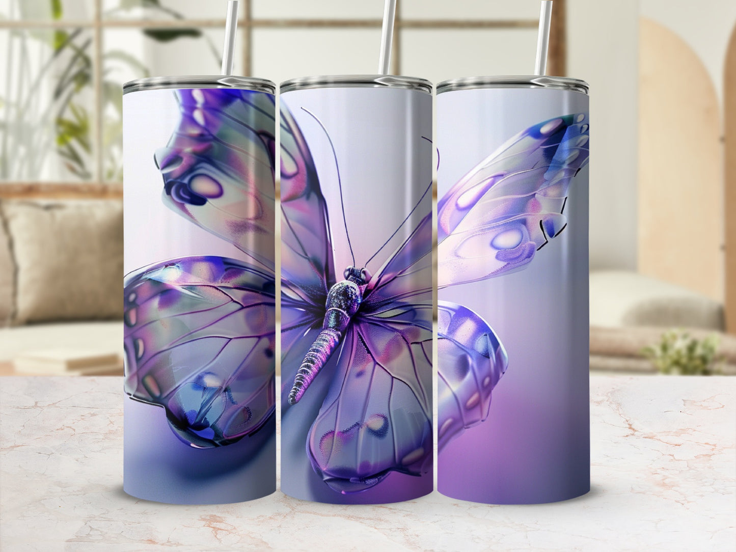 Three tumblers with iridescent purple butterfly designs and straws.