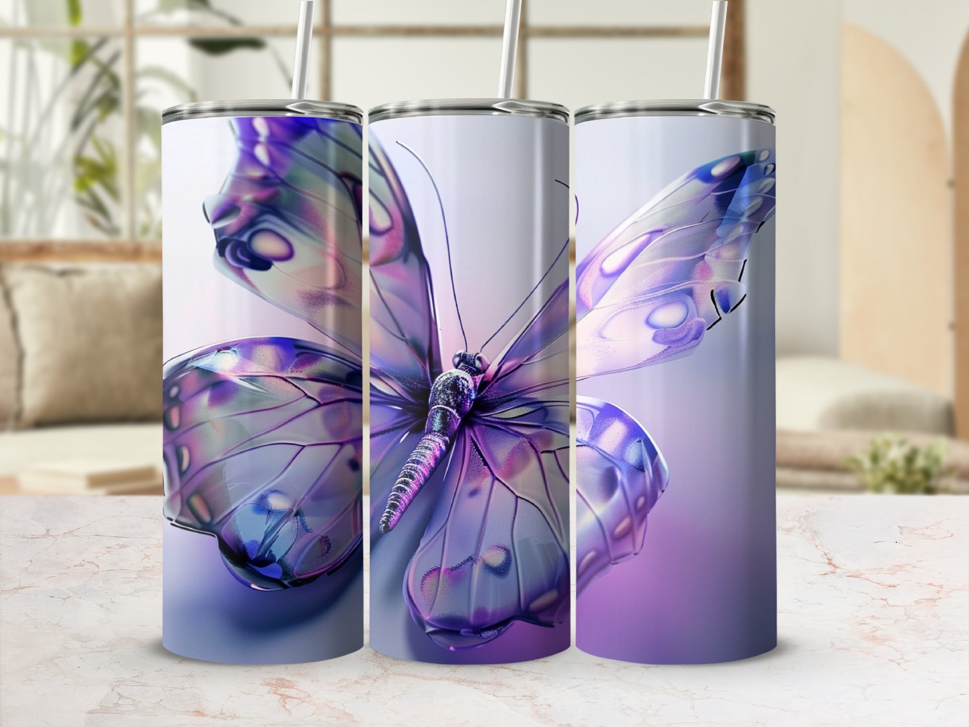 Three tumblers with iridescent purple butterfly designs and straws.