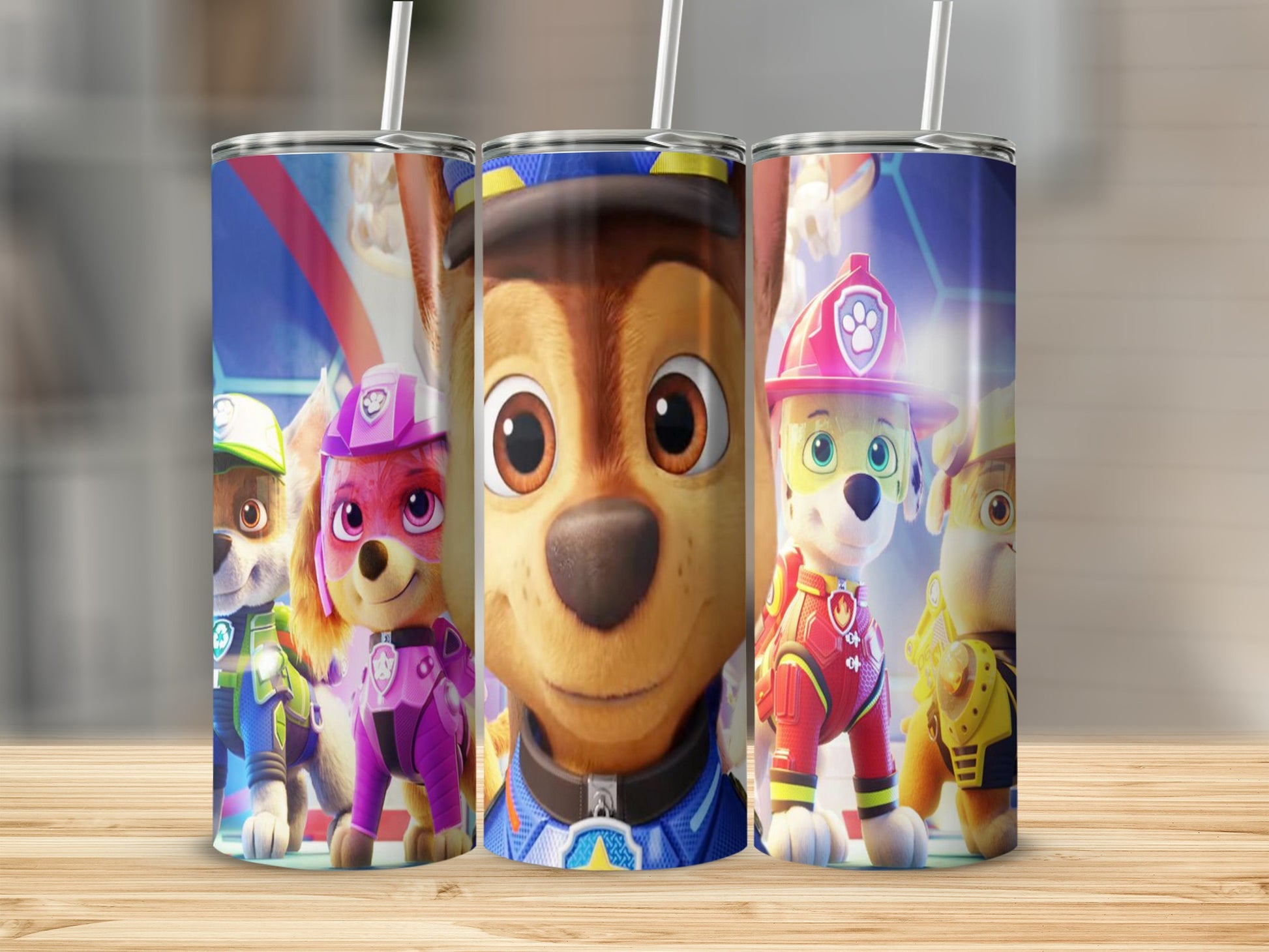Paw Patrol characters Chase, Skye, and Marshall on a tumbler.