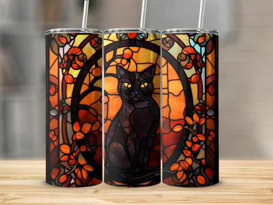 Black cat with yellow eyes on stained glass design tumbler.