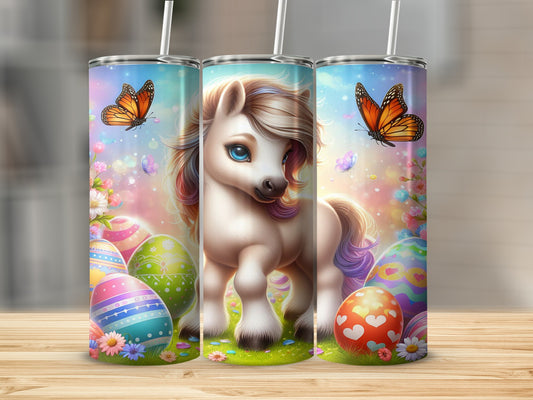 Unicorn and Easter eggs design on a set of three tumblers.