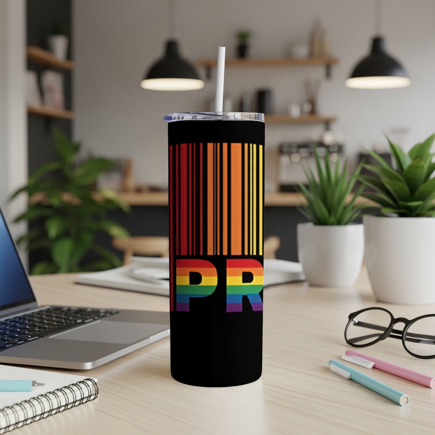Black tumbler with rainbow barcode design and white straw.