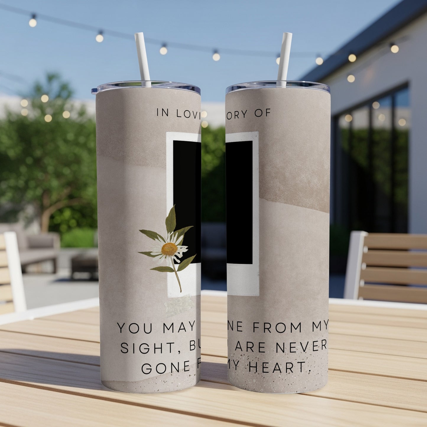 Two tumblers with a dried daisy and text "In loving memory of" and "You may be gone from my sight, but never from my heart."