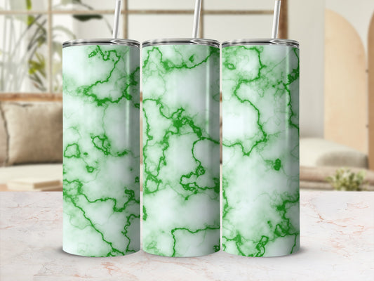 Three green marble pattern tumblers with straws on a white marble surface.