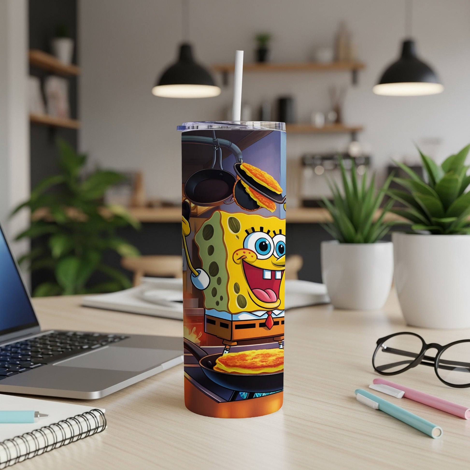SpongeBob SquarePants on a tumbler, cooking pancakes on a stovetop.
