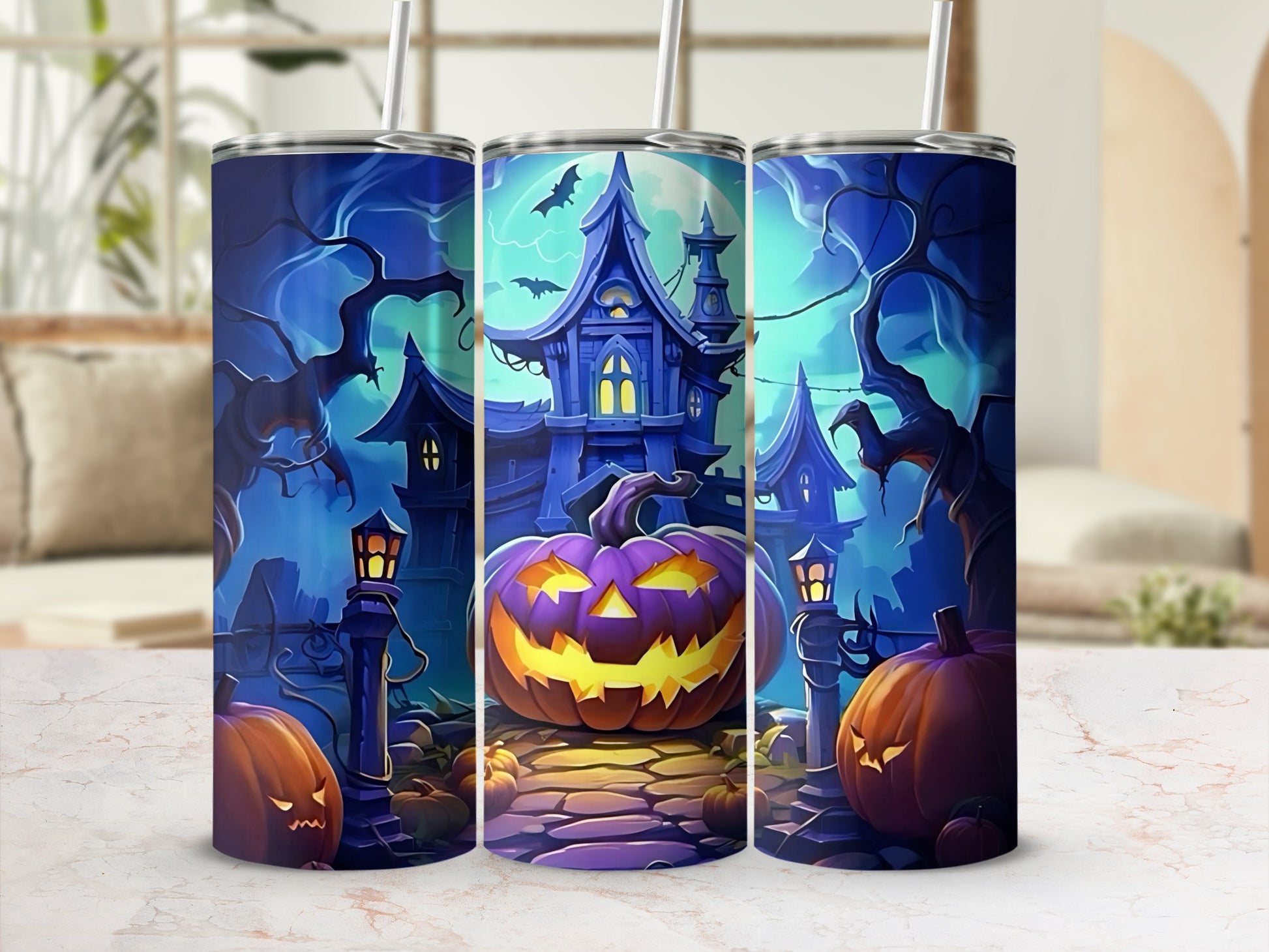 Three tumblers with a spooky Halloween scene featuring a haunted house, pumpkins, and bats.