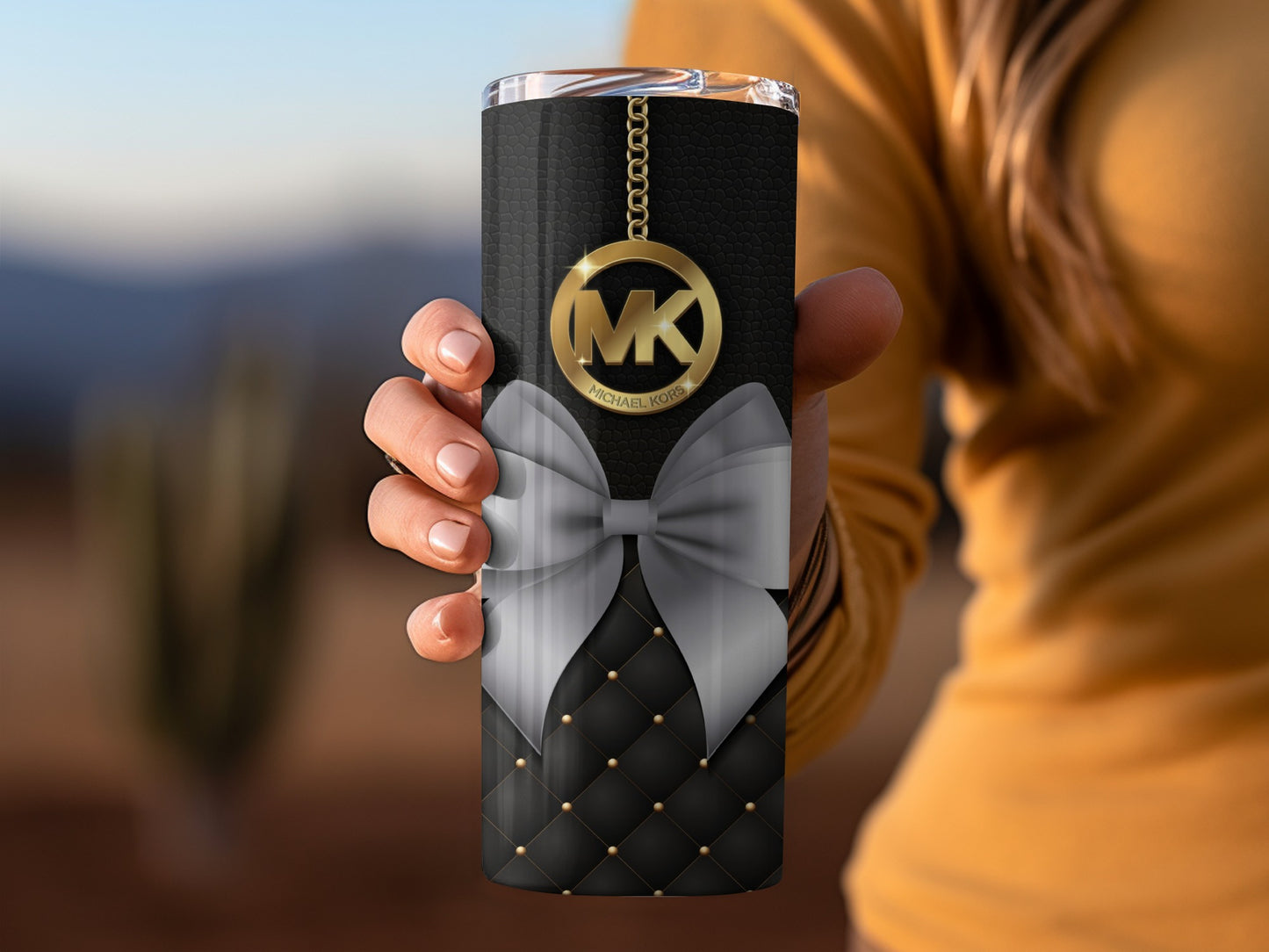 Elegant Black and Gold Tumbler with Bow Design
