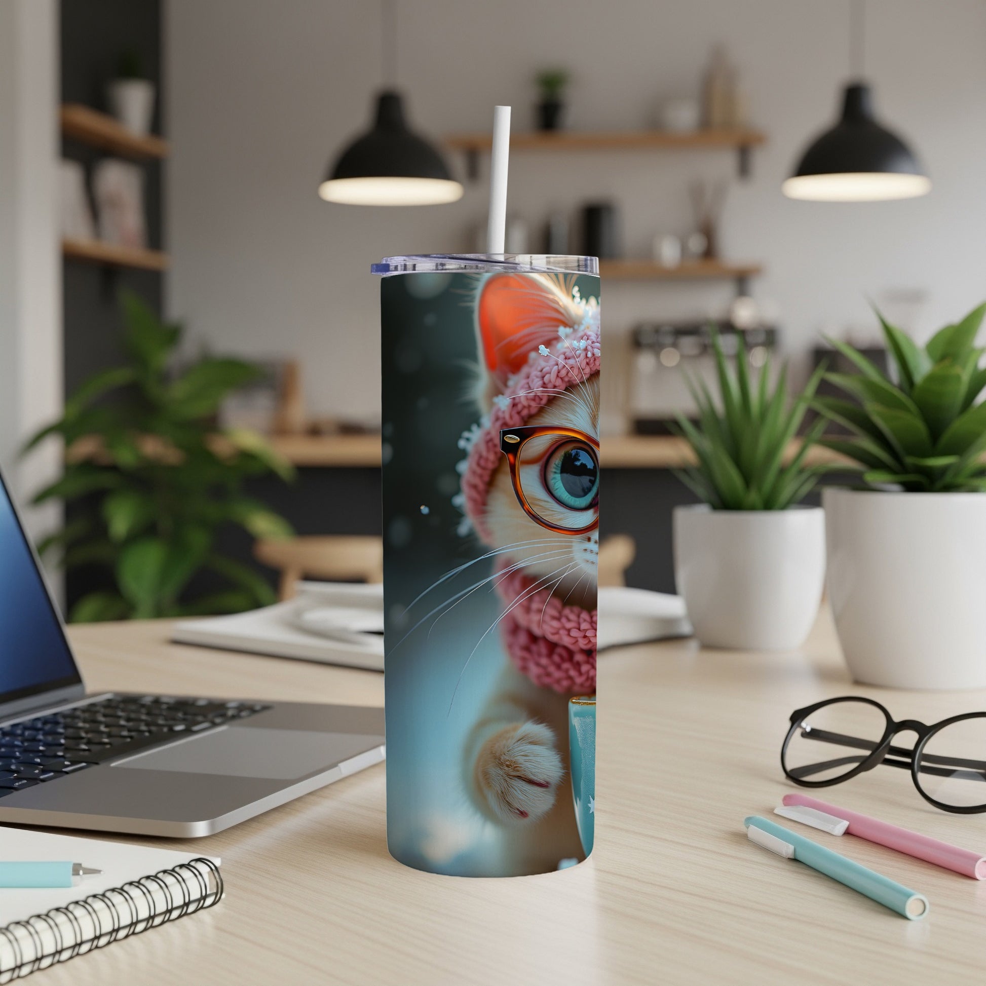 Tumbler with a cartoon cat wearing a pink scarf and hat.