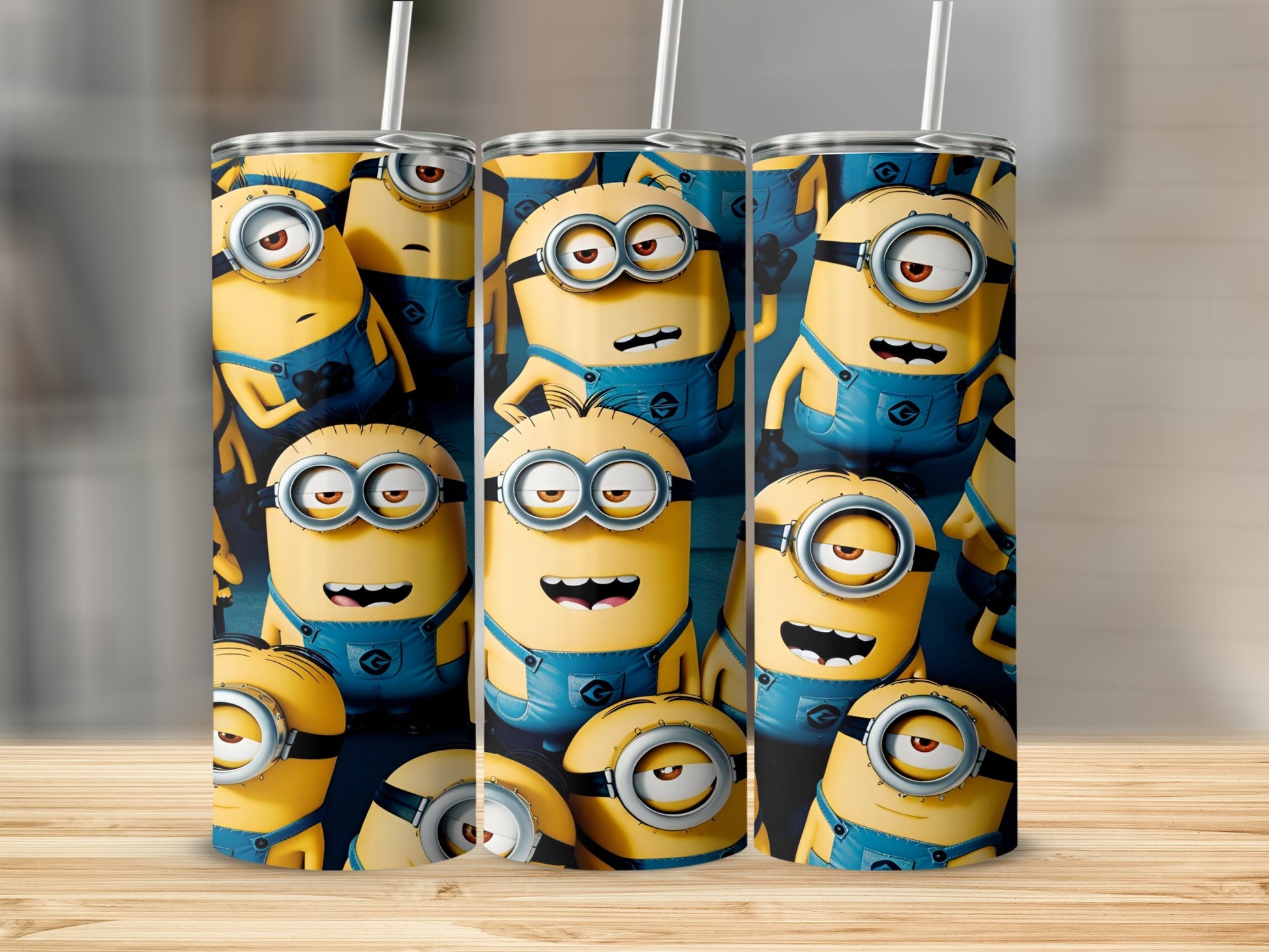 Three tall tumblers decorated with cartoon Minions.