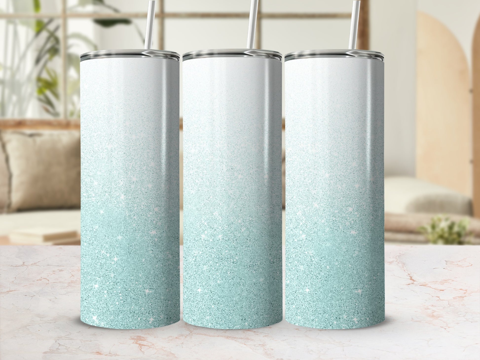 Three tall, slender tumblers with a sparkling gradient design.