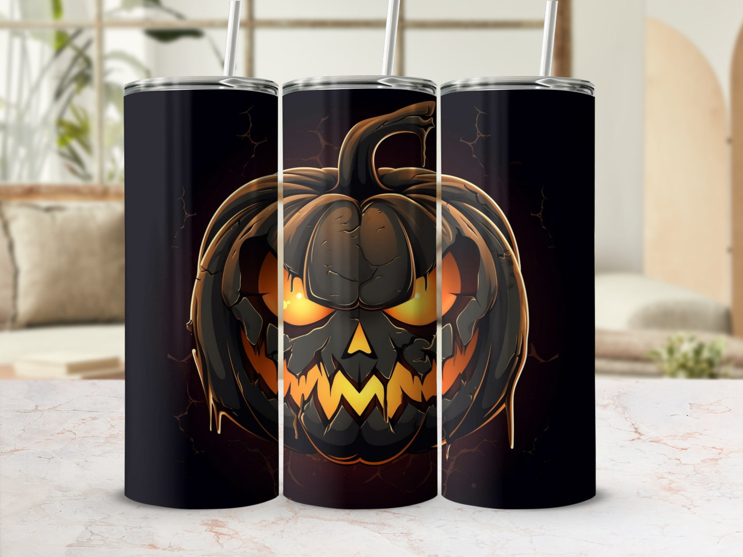 Three tumblers featuring a spooky jack-o'-lantern with glowing eyes and jagged teeth.