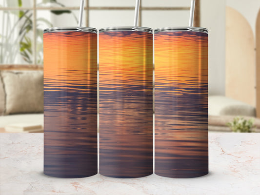 Three tumblers with a sunset water reflection design.