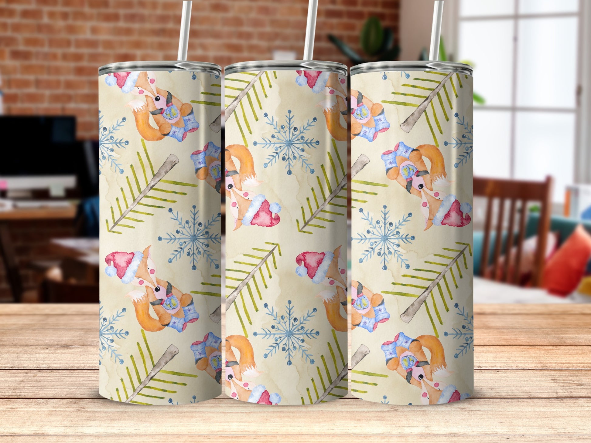 Three cylindrical tumblers with a holiday fox and snowflake design.
