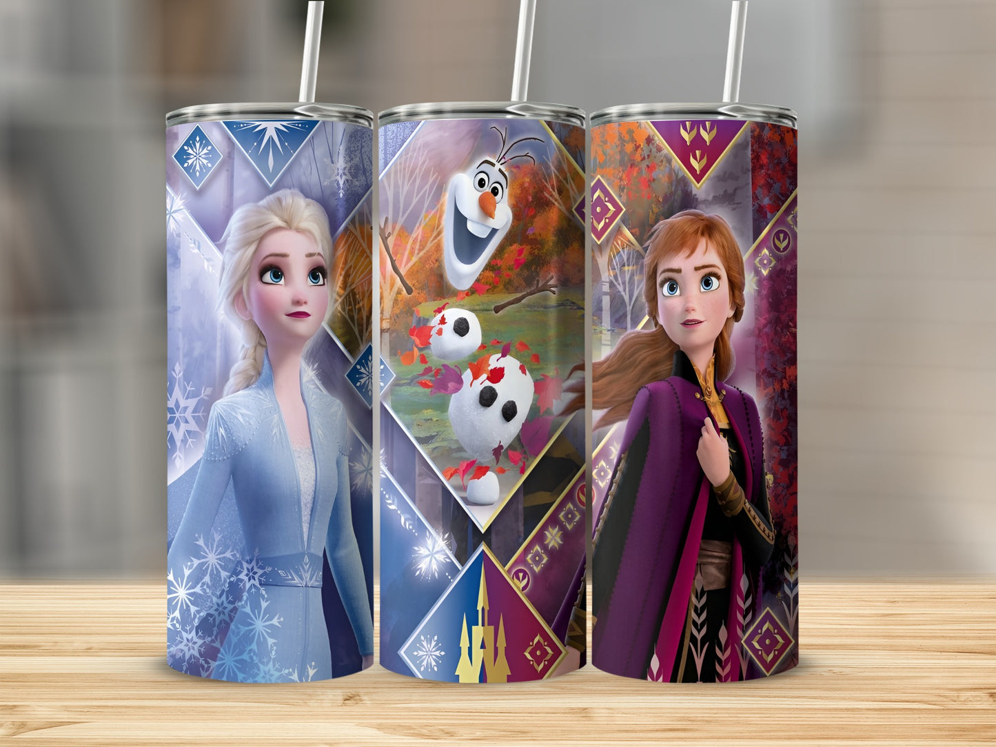 Anna and Elsa from Frozen with Olaf on three decorative tumblers.