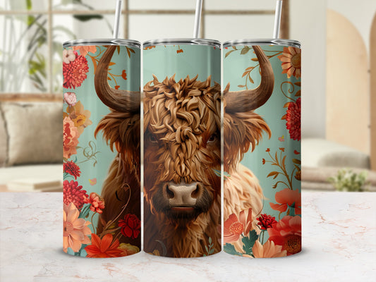 Highland cow with floral border on a patterned tumbler.