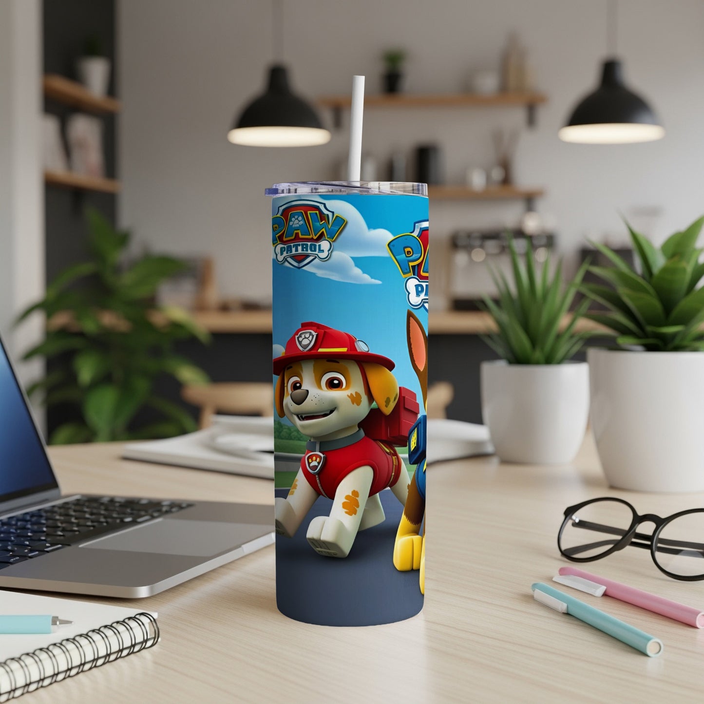 Paw Patrol Marshall character on a blue tumbler with a straw.