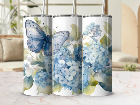 Blue butterfly and light blue hydrangeas on a white tumbler.