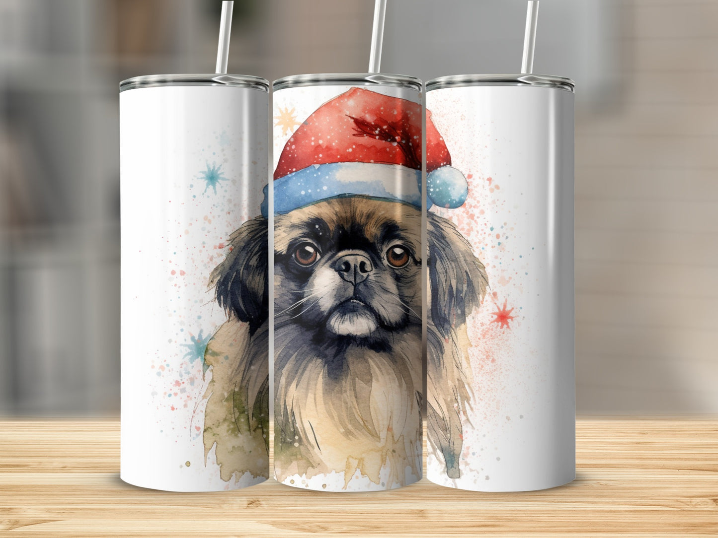 Dog wearing Santa hat, with watercolor splashes, on three tumblers.