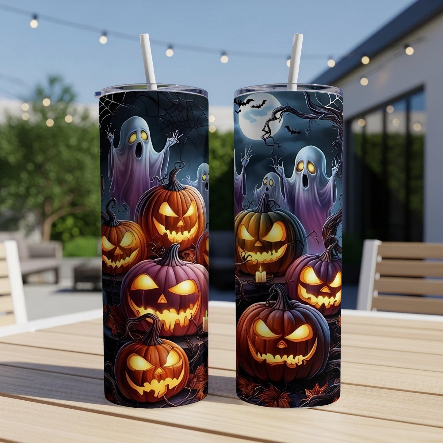 Halloween themed tumblers with ghosts and jack-o-lanterns on a dark, moonlit background.