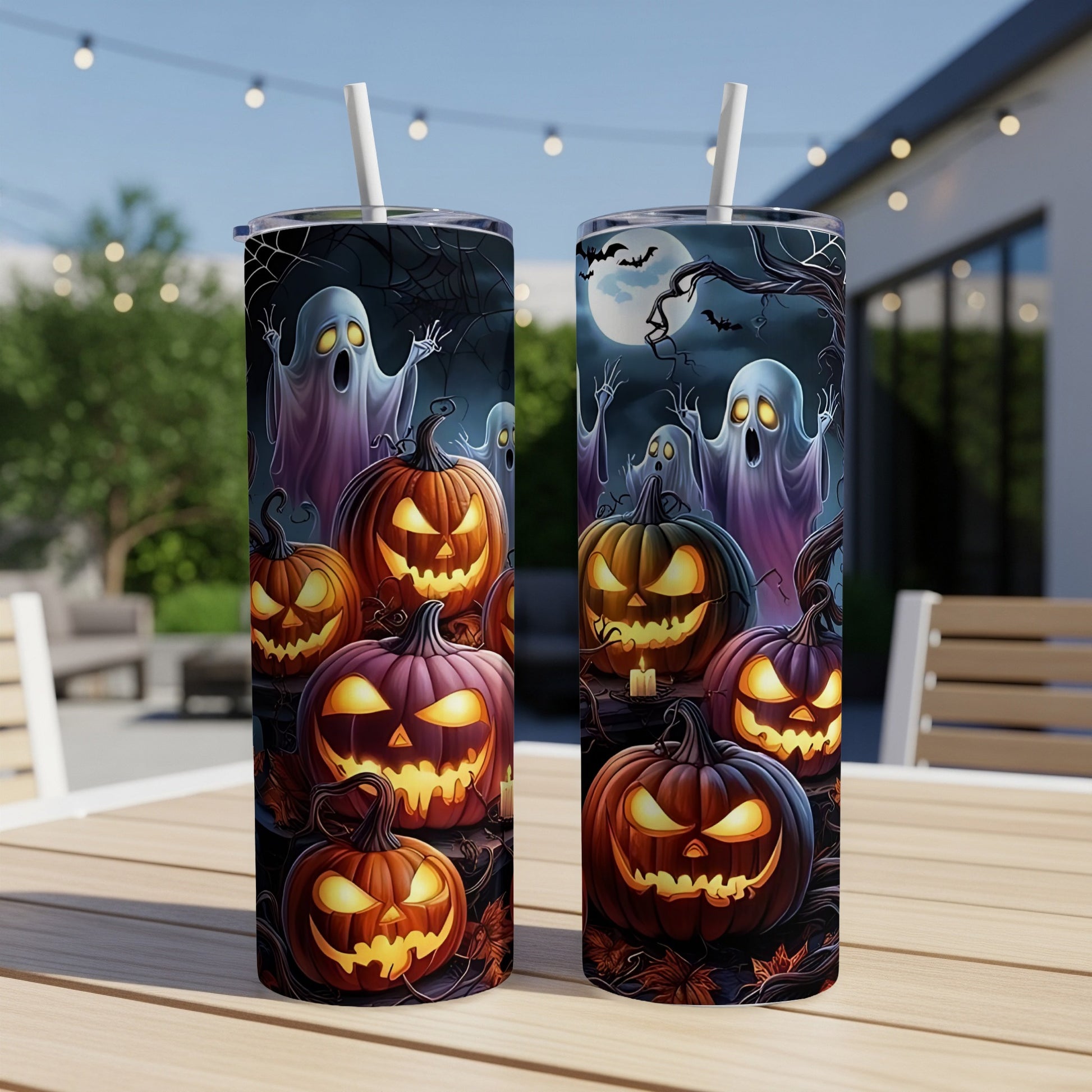 Halloween themed tumblers with ghosts and jack-o-lanterns on a dark, moonlit background.