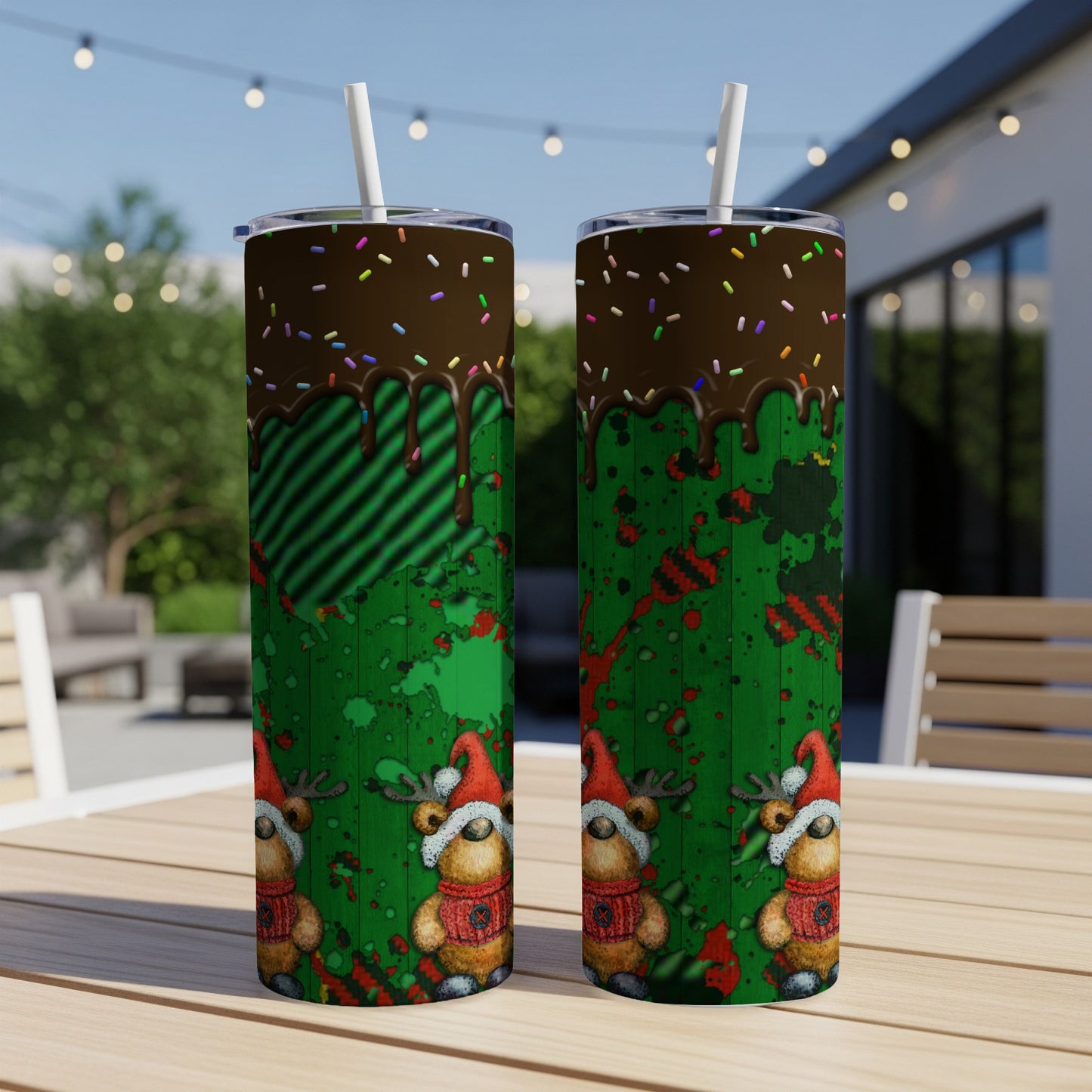 Two tall tumblers with a Christmas reindeer and chocolate drip design.