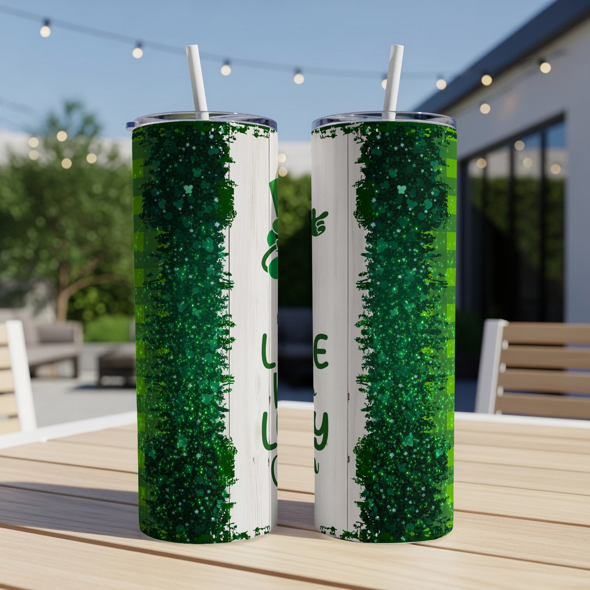 Two tumblers with a green glitter design and "Feeling Lucky" text.